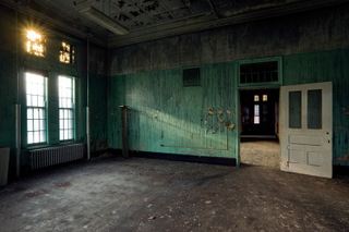 Illustration for article titled The Creepy World of Abandoned Asylums